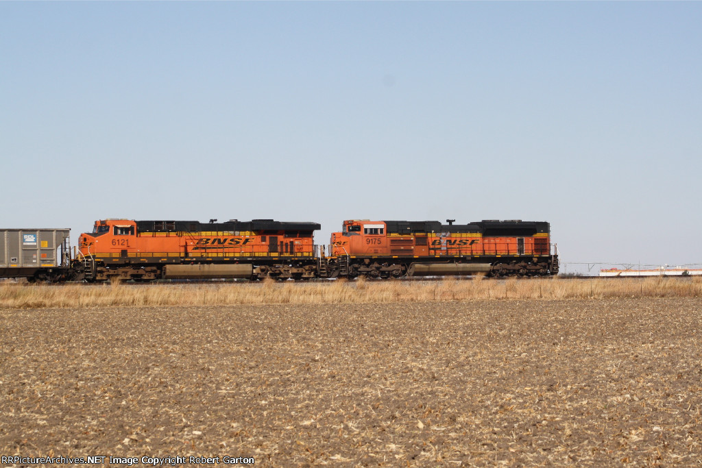 BNSF 6121 & 9175 push an empty coal train west